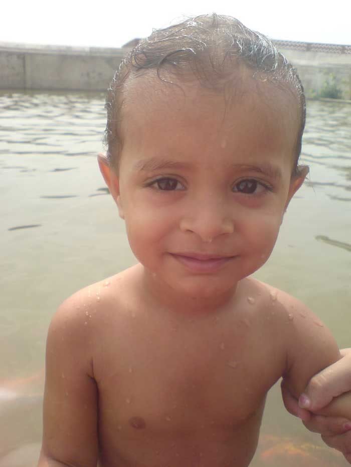 boy bathing in swiming pool