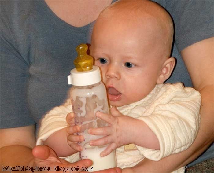 baby eating milk