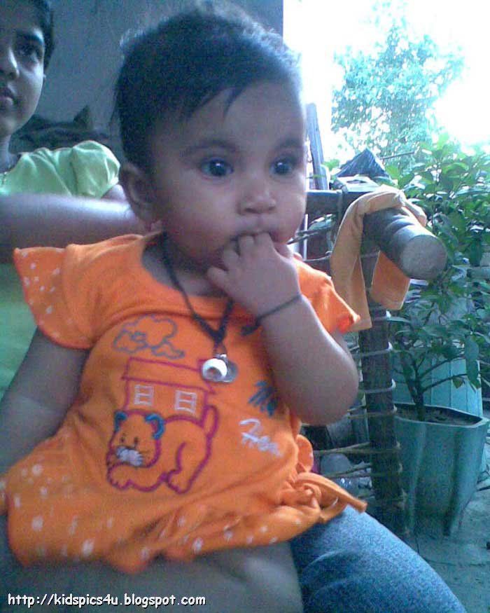 so cute baby in orange dress