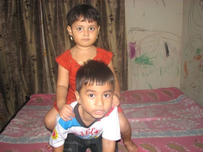 cute boy with her sister
