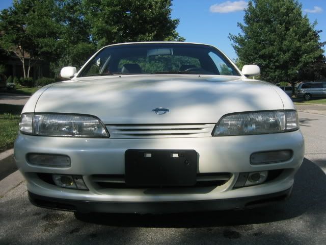 http://i297.photobucket.com/albums/mm205/briggs_d85/white%20car/whitecar014.jpg