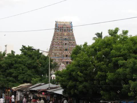 kapAli temple gopuram through trees