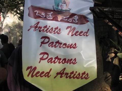 artists need patrons slogan 250109