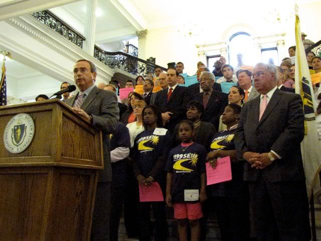 Secretary Kevin Burke speaks in front of Mayor Thomas Menino and supporters of CORI reform
