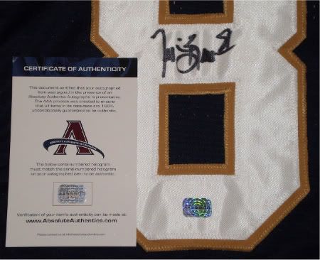 This custom Notre Dame jersey was hand signed by Tim Brown, former 